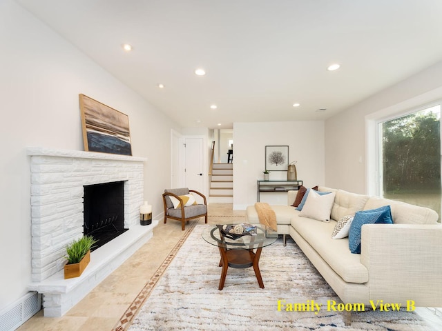 5028 Coyle Ave, Skokie, IL 60077 - living area with stairs, inlaid floor details, recessed lighting, and a stone fireplace