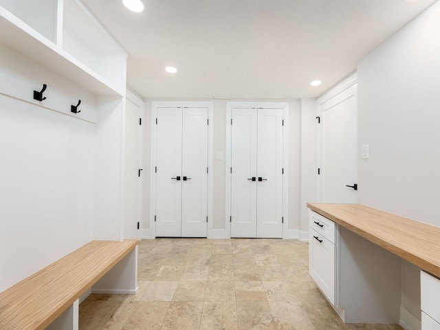 5028 Coyle Ave, Skokie, IL 60077 - mudroom featuring recessed lighting and baseboards
