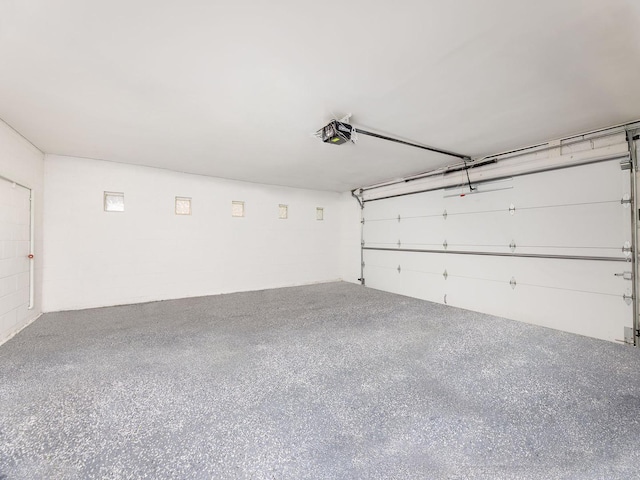 5028 Coyle Ave, Skokie, IL 60077 - garage featuring a garage door opener