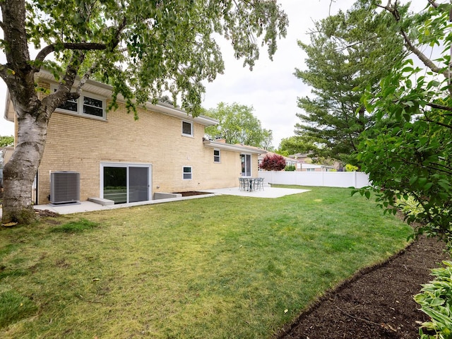 5028 Coyle Ave, Skokie, IL 60077 - rear view of house featuring a patio area and brick siding