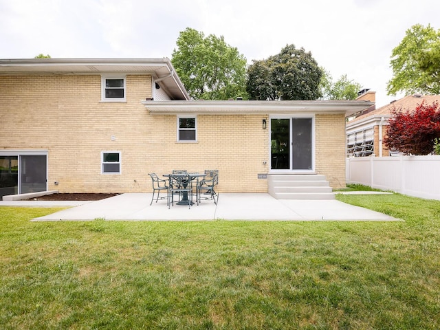 5028 Coyle Ave, Skokie, IL 60077 - back of house with brick siding, entry steps, and a patio