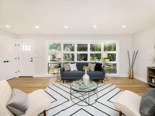 5028 Coyle Ave, Skokie, IL 60077 - living area with plenty of natural light, light wood finished floors, and recessed lighting