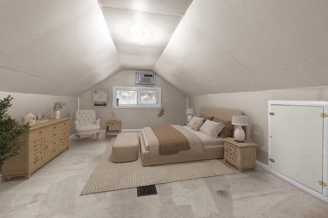 2911 Preston St, Rockford, IL 61102 - bedroom with light carpet, vaulted ceiling, and an AC wall unit