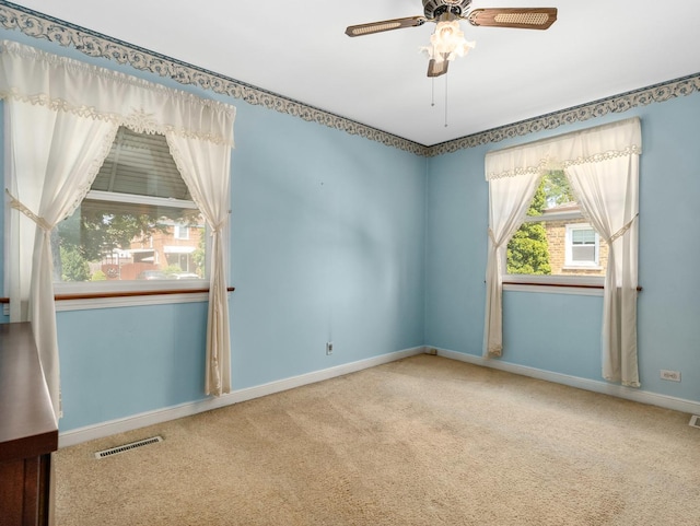 2443 S 4th Ave, North Riverside, IL 60546 - carpeted empty room featuring a ceiling fan and baseboards