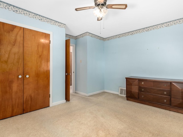2443 S 4th Ave, North Riverside, IL 60546 - unfurnished bedroom featuring carpet floors, a ceiling fan, and a closet