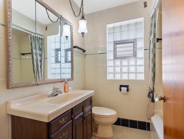 2443 S 4th Ave, North Riverside, IL 60546 - full bath with tile walls, vanity, shower / bath combo, and tile patterned floors