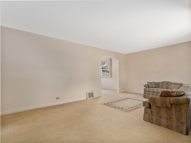 2443 S 4th Ave, North Riverside, IL 60546 - living area featuring arched walkways and carpet floors