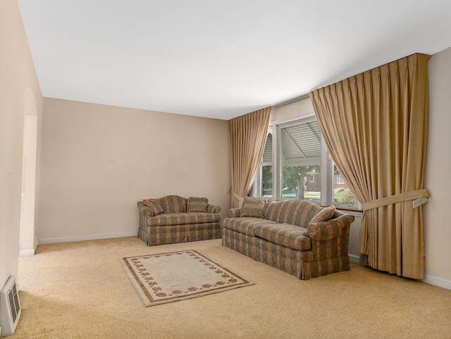 2443 S 4th Ave, North Riverside, IL 60546 - living room featuring carpet flooring and baseboards
