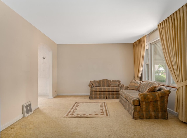 2443 S 4th Ave, North Riverside, IL 60546 - living room with carpet floors and arched walkways