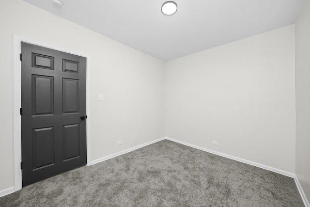 712 W 48th Pl, Chicago, IL 60609 - carpeted spare room featuring baseboards