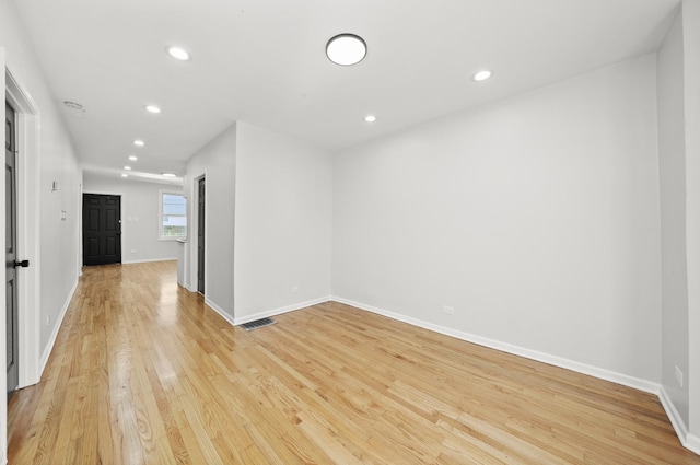 712 W 48th Pl, Chicago, IL 60609 - spare room featuring light wood finished floors and recessed lighting
