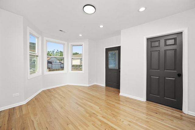 712 W 48th Pl, Chicago, IL 60609 - unfurnished room featuring light wood-style floors and recessed lighting
