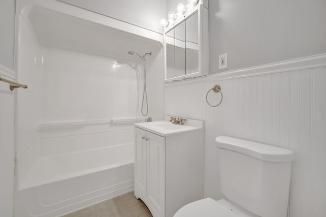 12247 S Avers Ave, Alsip, IL 60803 - bathroom featuring vanity, bathing tub / shower combination, a wainscoted wall, and tile patterned flooring