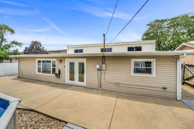12247 S Avers Ave, Alsip, IL 60803 - rear view of property with french doors and a patio area