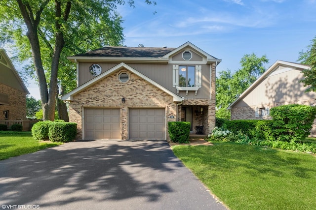 134 Country Club Dr, Bloomingdale, IL 60108 - traditional-style house with driveway, brick siding, and a front lawn