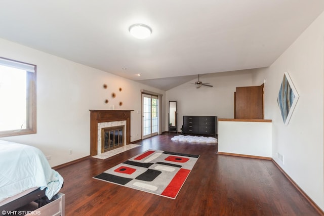 134 Country Club Dr, Bloomingdale, IL 60108 - bedroom with wood finished floors, a high end fireplace, and lofted ceiling