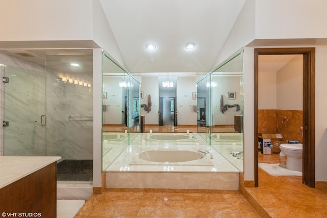 134 Country Club Dr, Bloomingdale, IL 60108 - full bathroom with a garden tub, a stall shower, vanity, vaulted ceiling, and tile patterned floors