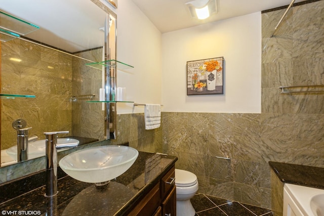 134 Country Club Dr, Bloomingdale, IL 60108 - full bathroom with tile walls, vanity, tile patterned flooring, wainscoting, and a shower
