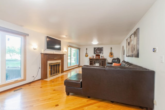 134 Country Club Dr, Bloomingdale, IL 60108 - living area with a fireplace with flush hearth and light wood-style flooring