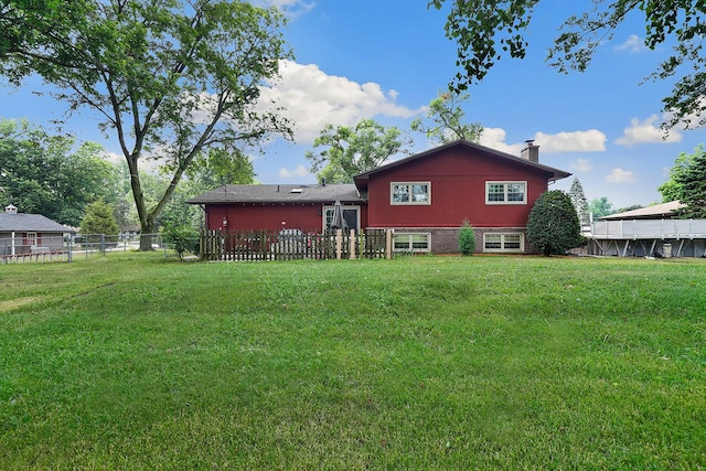 13420 Florence Rd, Mokena, IL 60448 - rear view of property with a chimney