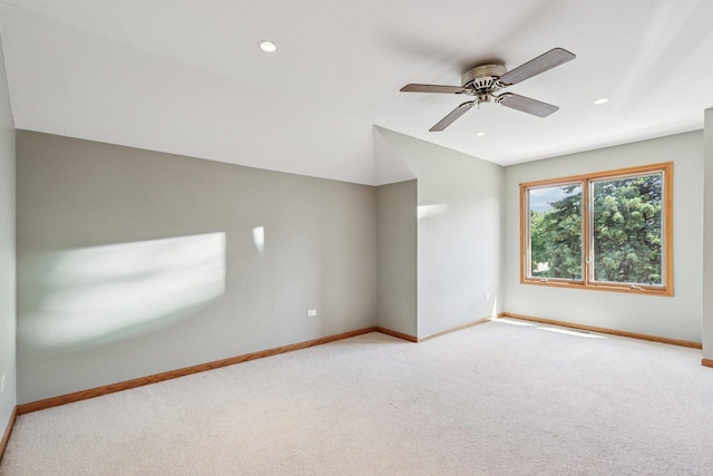641 Mason Ln, Lake In The Hills, IL 60156 - spare room with light colored carpet, ceiling fan, lofted ceiling, and recessed lighting
