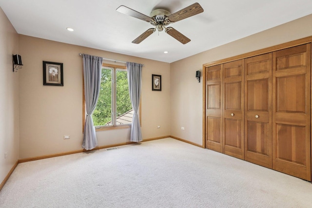 641 Mason Ln, Lake In The Hills, IL 60156 - unfurnished bedroom featuring light carpet, a ceiling fan, recessed lighting, and a closet