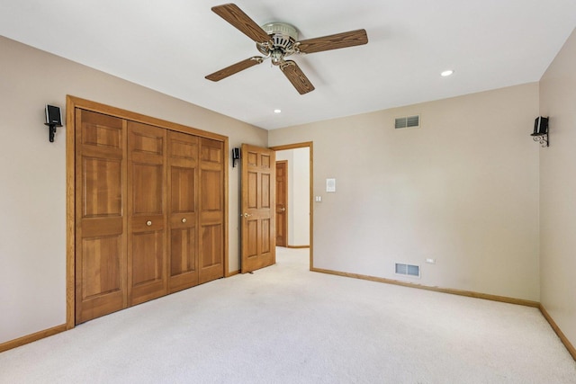 641 Mason Ln, Lake In The Hills, IL 60156 - unfurnished bedroom featuring light colored carpet, a closet, recessed lighting, and ceiling fan