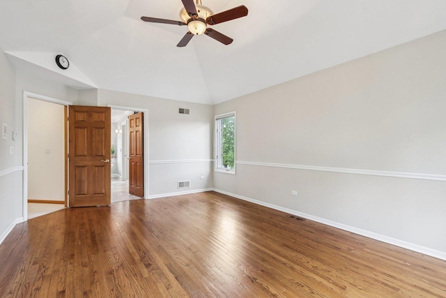641 Mason Ln, Lake In The Hills, IL 60156 - spare room featuring a ceiling fan, lofted ceiling, and wood finished floors