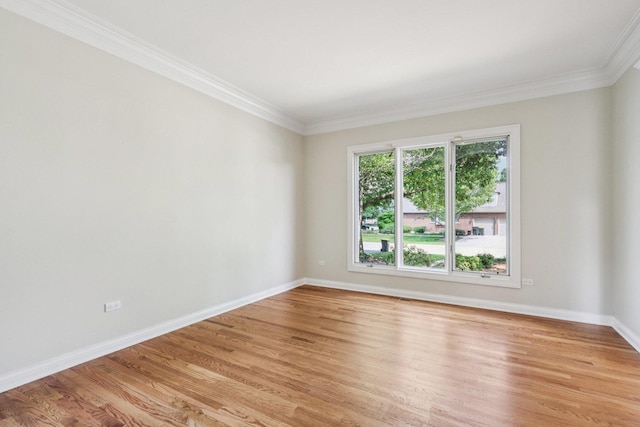 641 Mason Ln, Lake In The Hills, IL 60156 - spare room with ornamental molding and light wood-style floors