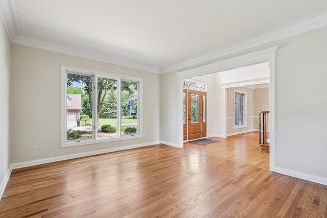 641 Mason Ln, Lake In The Hills, IL 60156 - spare room featuring light wood-type flooring and ornamental molding