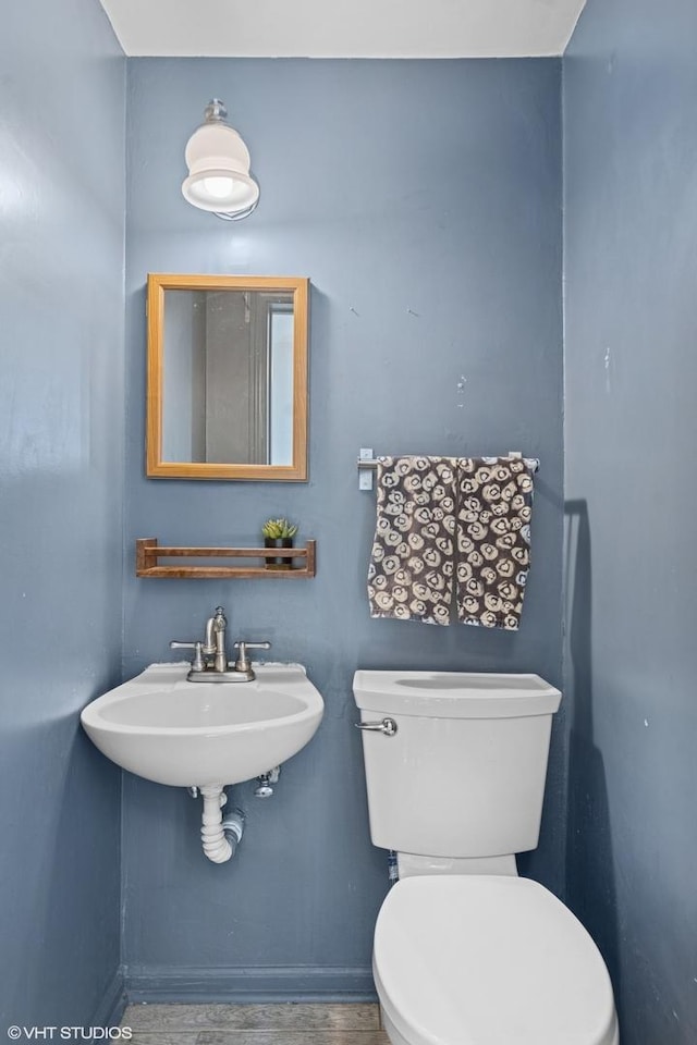 861 Hill Ave, Glen Ellyn, IL 60137 - half bathroom with a sink and wood finished floors