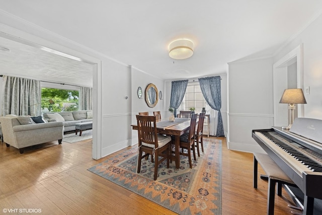 861 Hill Ave, Glen Ellyn, IL 60137 - dining space featuring ornamental molding and wood finished floors