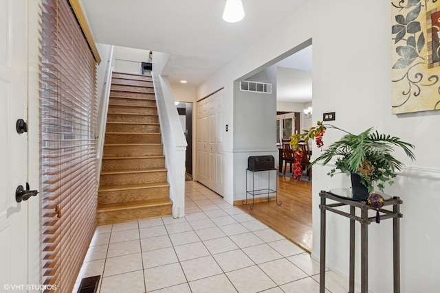 20 Brook Ln, Palos Park, IL 60464 - entryway with stairway and light tile patterned flooring