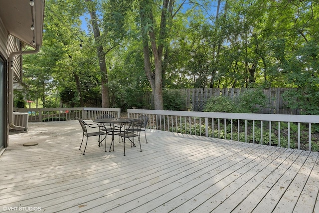 20 Brook Ln, Palos Park, IL 60464 - wooden terrace featuring a fenced backyard, outdoor dining space, and view of scattered trees