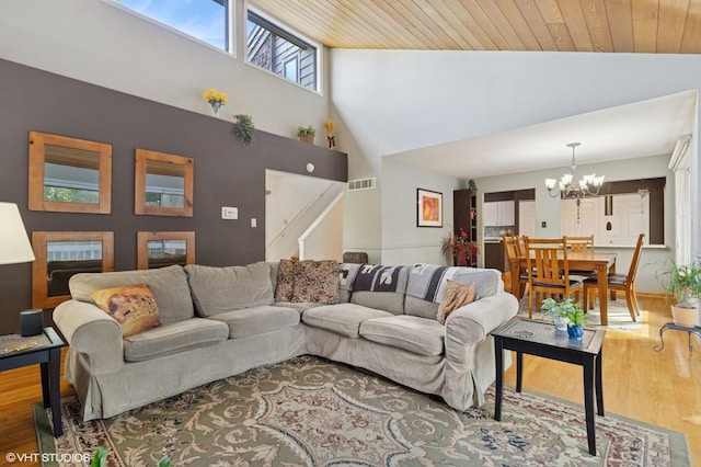 20 Brook Ln, Palos Park, IL 60464 - living room featuring a chandelier, wood finished floors, a towering ceiling, stairs, and wooden ceiling