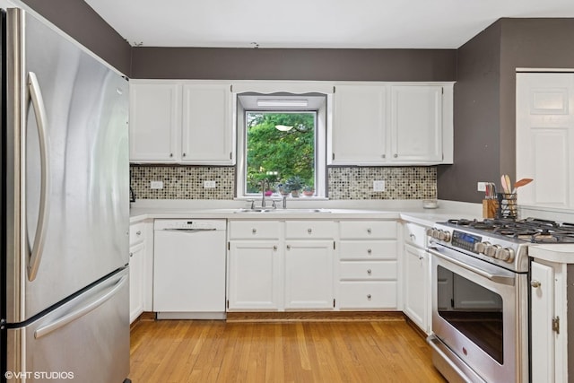 20 Brook Ln, Palos Park, IL 60464 - kitchen with stainless steel appliances, light countertops, tasteful backsplash, and light wood-type flooring