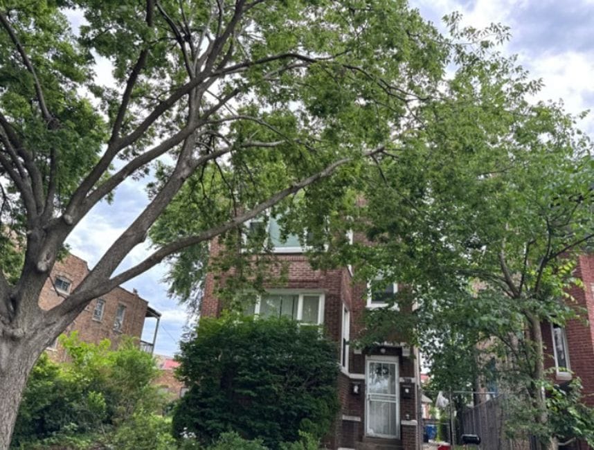 8037 S Sangamon St, Chicago, IL 60620 - view of property hidden behind natural elements with brick siding