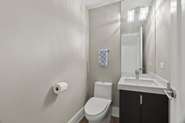6223 S Ellis Ave, Chicago, IL 60637 - half bathroom featuring vanity and toilet