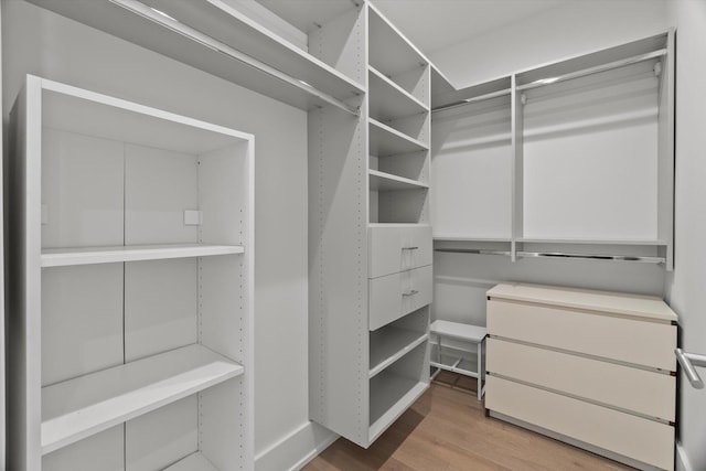 6223 S Ellis Ave, Chicago, IL 60637 - walk in closet featuring wood finished floors
