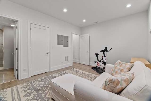 6223 S Ellis Ave, Chicago, IL 60637 - living area featuring electric panel, light wood-style floors, and recessed lighting