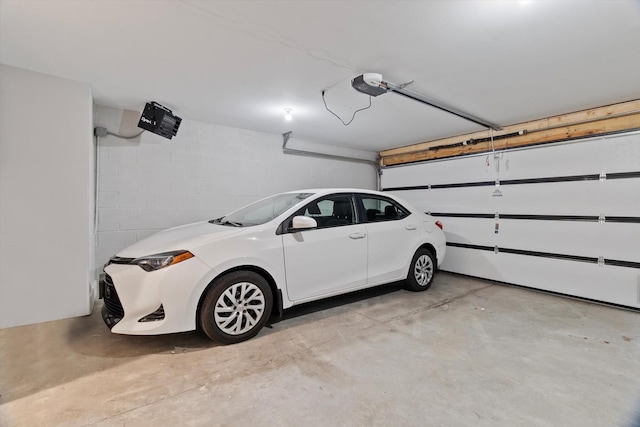 6223 S Ellis Ave, Chicago, IL 60637 - garage with concrete block wall and a garage door opener