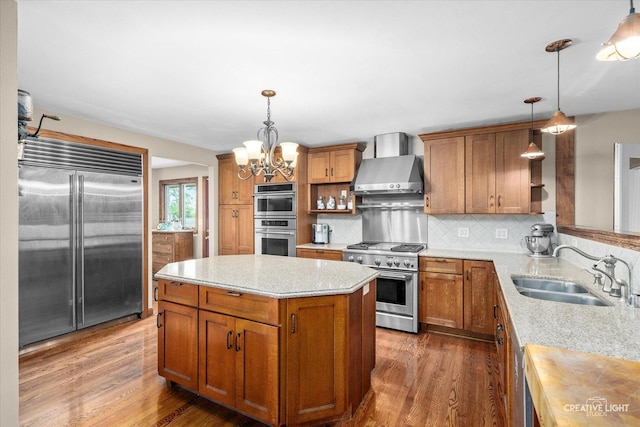 45W251 Ic Trl, Maple Park, IL 60151 - kitchen with high end appliances, wall chimney range hood, and brown cabinets