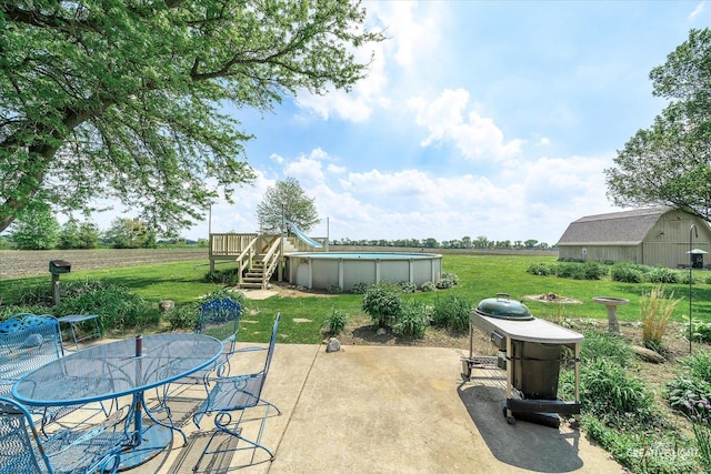 45W251 Ic Trl, Maple Park, IL 60151 - view of patio / terrace featuring outdoor dining space, a wooden deck, and an outdoor pool