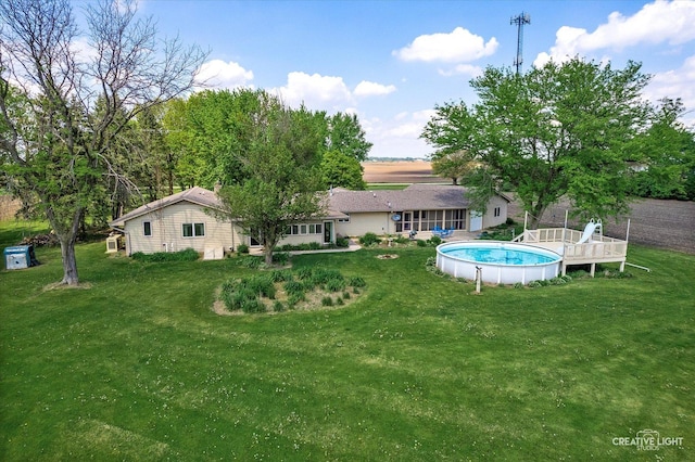 45W251 Ic Trl, Maple Park, IL 60151 - back of house with an outdoor pool and a lawn