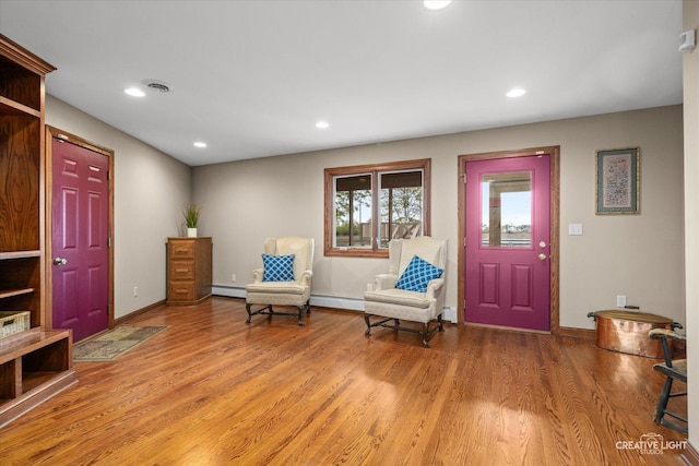 45W251 Ic Trl, Maple Park, IL 60151 - foyer entrance featuring a baseboard radiator, light wood-style floors, and recessed lighting