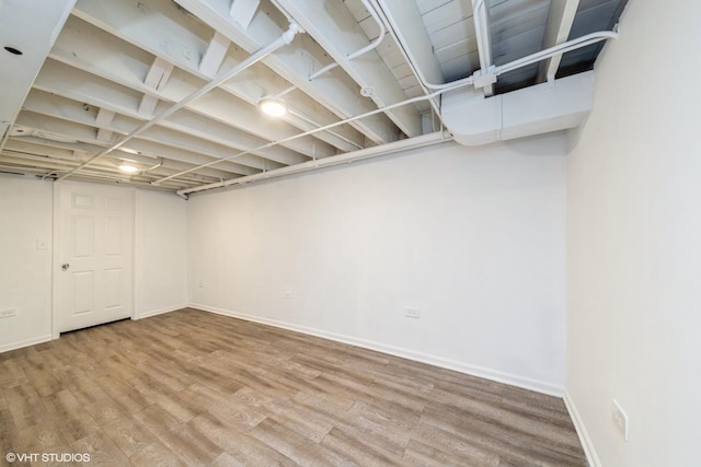 247 Tioga Ave, Bensenville, IL 60106 - finished basement featuring wood finished floors and baseboards