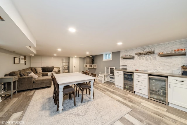 247 Tioga Ave, Bensenville, IL 60106 - dining room with beverage cooler, bar area, light wood-type flooring, and recessed lighting