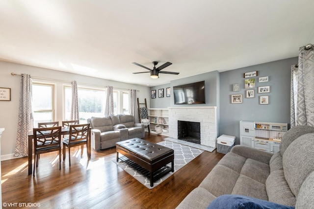 247 Tioga Ave, Bensenville, IL 60106 - living area featuring ceiling fan, dark wood finished floors, and a fireplace with flush hearth