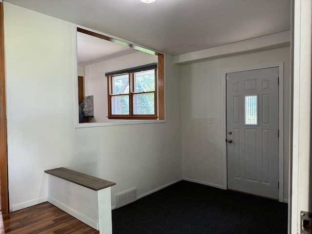 1536 Marberly Dr, Rockford, IL 61103 - foyer featuring baseboards and dark wood-style flooring