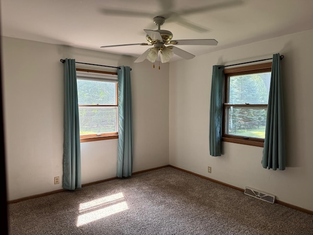1536 Marberly Dr, Rockford, IL 61103 - spare room featuring a ceiling fan and carpet